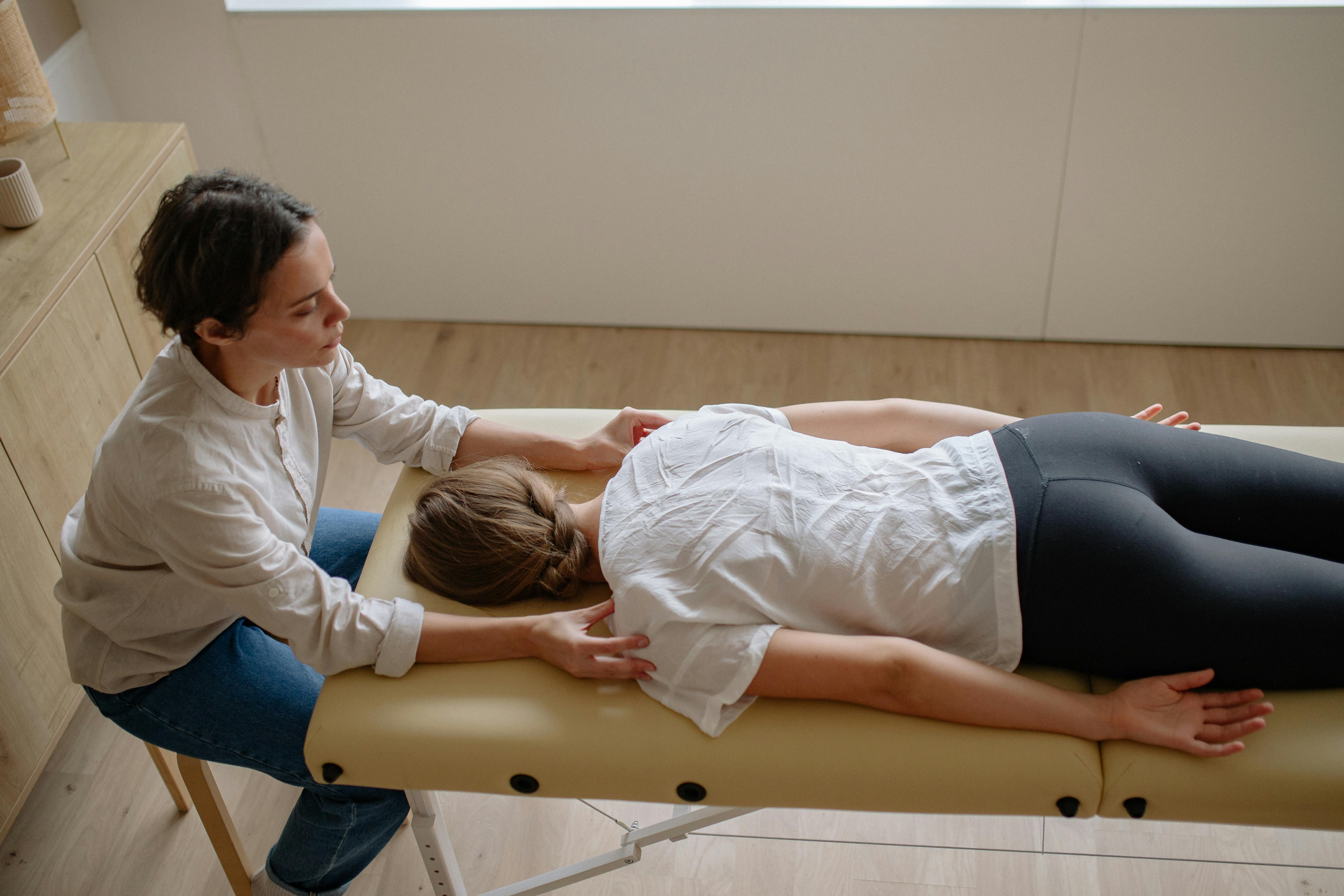 Patient laying down during physiotherapy treatment